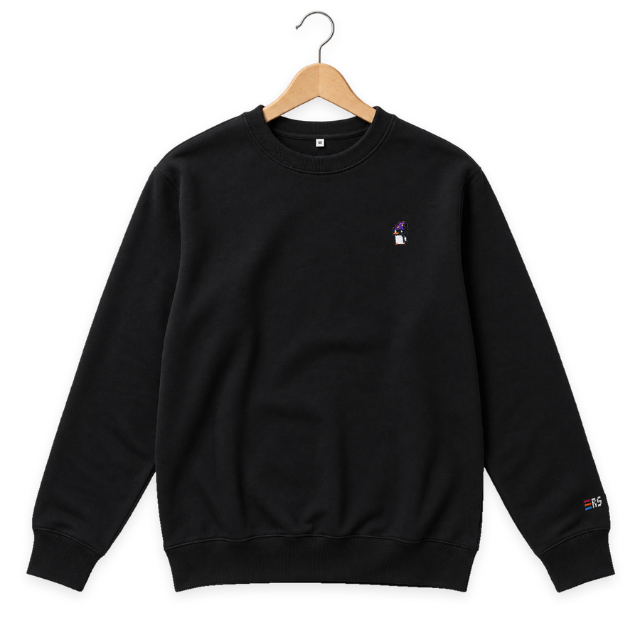 Pixel Pinguin Mit Zauberhut – Bestickter Bio Pullover · Schwarz · Bügel A