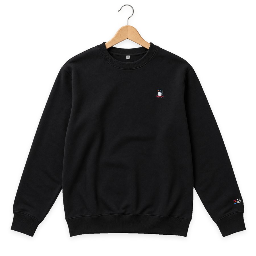 Pixel Pinguin Mit Skateboard – Bestickter Bio Pullover · Schwarz · Bügel A