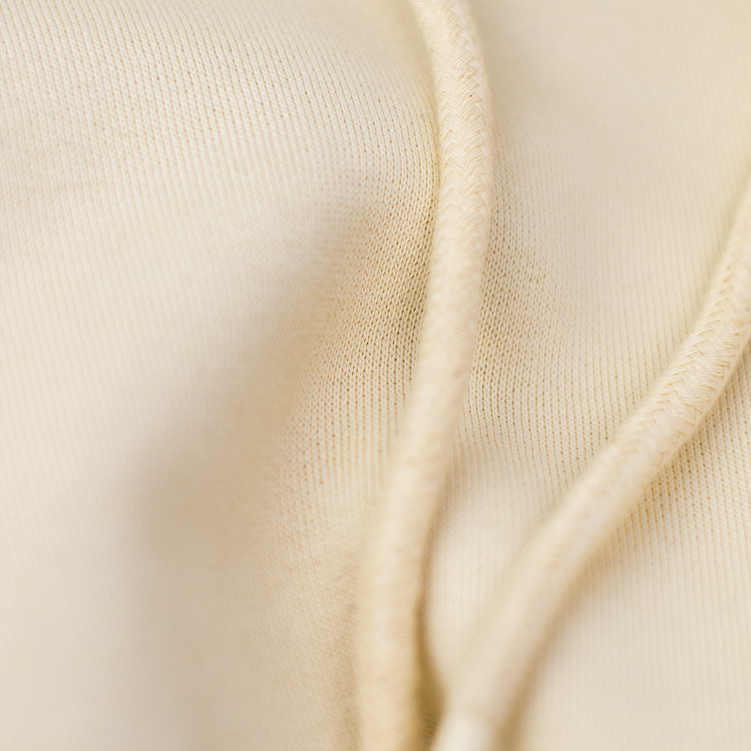 Pixel Dino Blau – Bestickter Bio Hoodie · Beige · Stoff und Verarbeitung, Ansicht 1