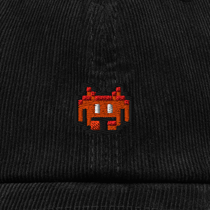 Pixel Alien Orange – Bestickte Cord Cap · Schwarz · Stick