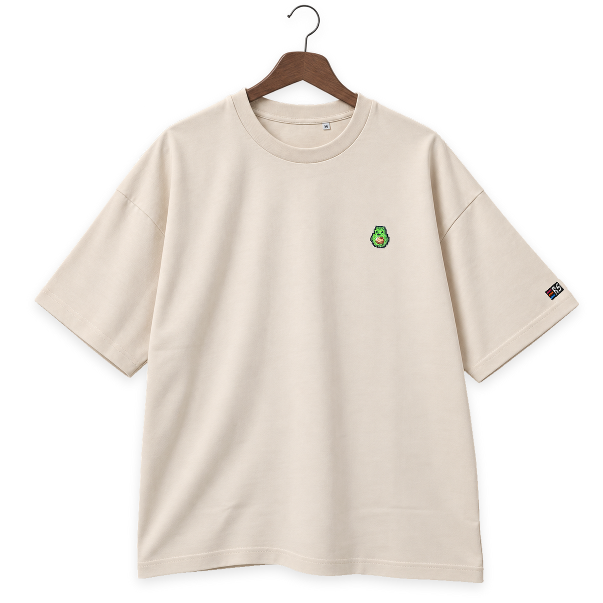 Pixel Avocado – Besticktes Bio Oversized T-Shirt · Beige · Bügel B