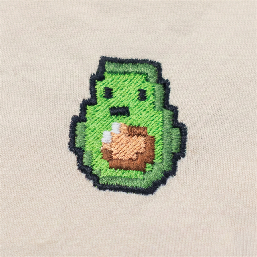 Pixel Avocado – Besticktes Bio Oversized T-Shirt · Beige · Stick-Close-up