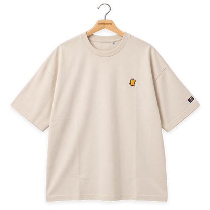Pixel Dino Orange – Besticktes Bio Oversized T-Shirt · Beige · Bügel A · Bügel V5