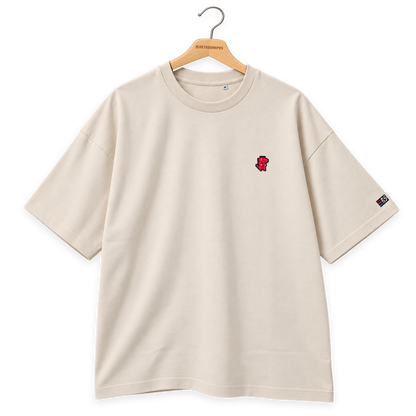 Pixel Dino Rot – Besticktes Bio Oversized T-Shirt · Beige · Bügel B · Bügel V6